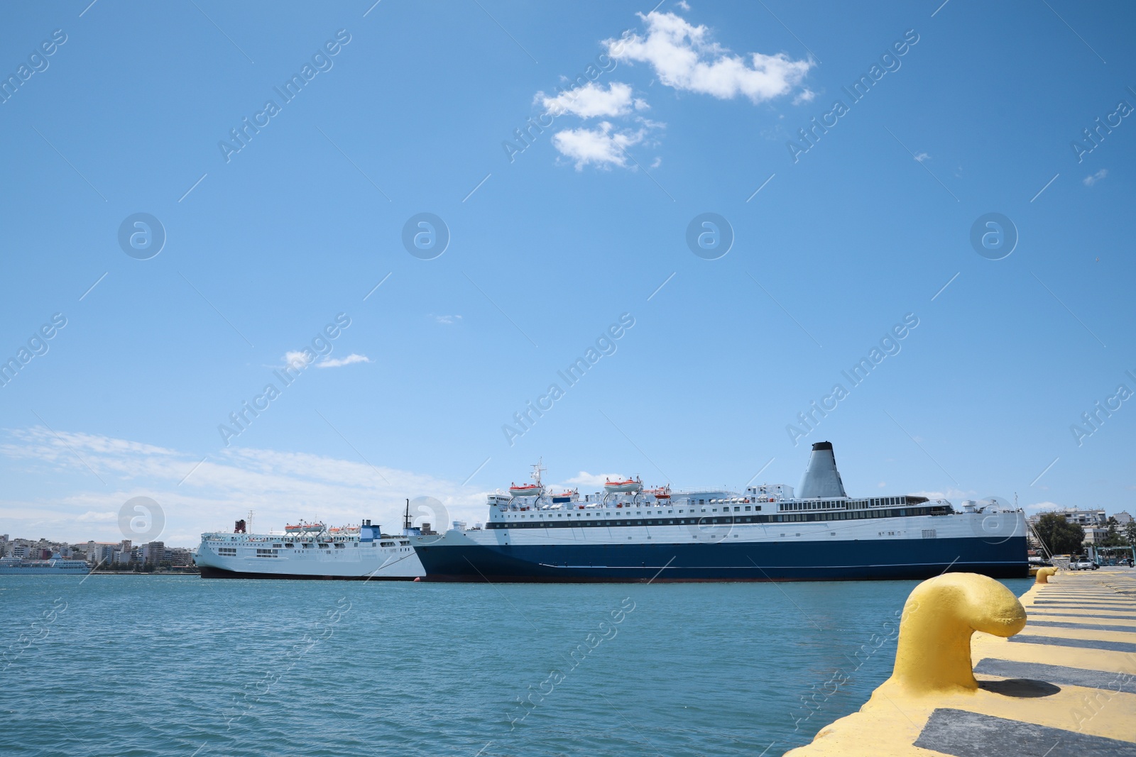 Photo of Modern ferry in sea port on sunny day