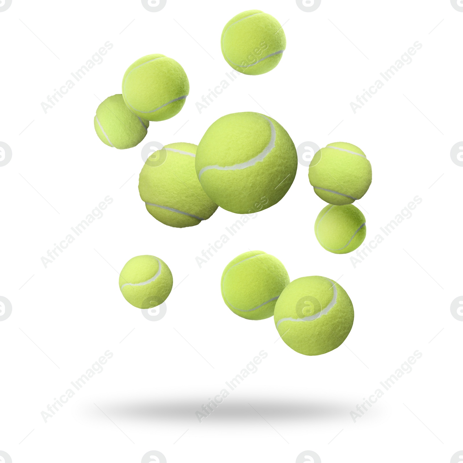 Image of Many tennis balls falling on white background