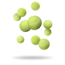 Many tennis balls falling on white background