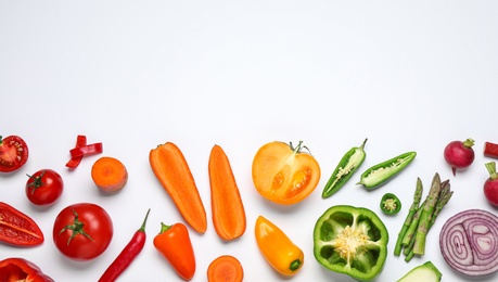 Different fresh vegetables on white background, top view