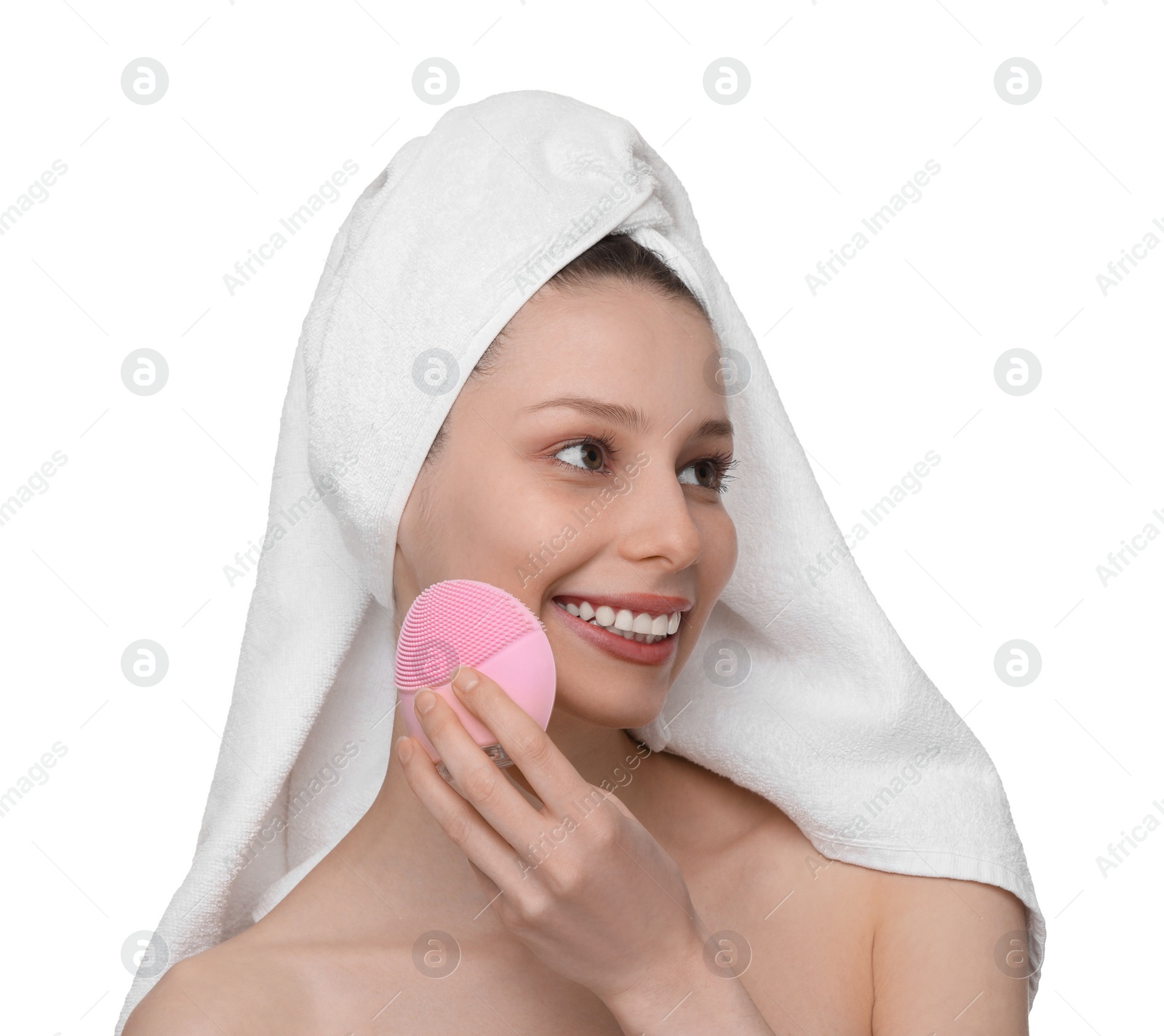 Photo of Washing face. Young woman with cleansing brush on white background