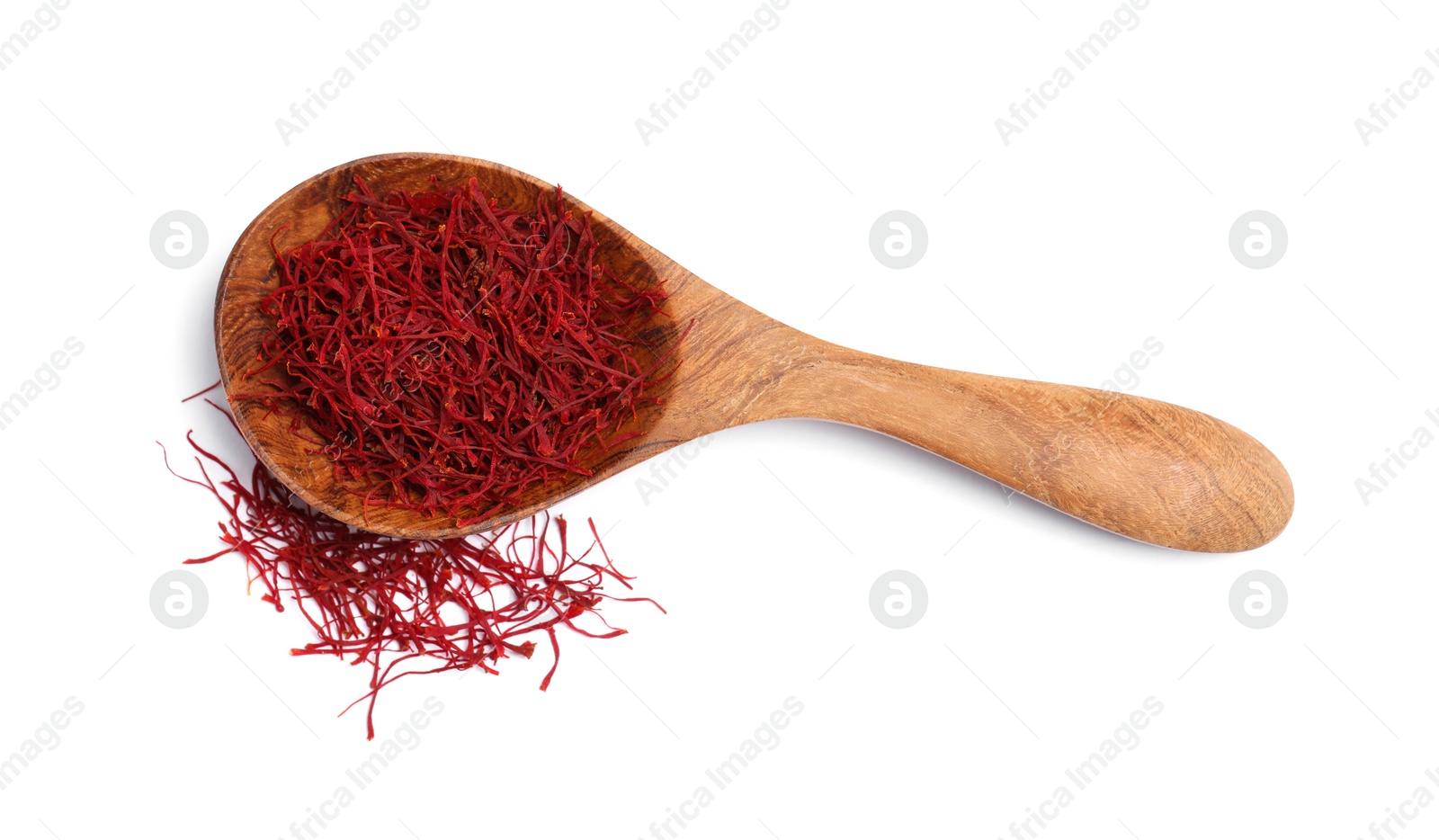 Photo of Aromatic saffron and spoon isolated on white, top view