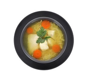 Photo of Tasty chicken soup with noodles, carrot and parsley in bowl isolated on white, top view