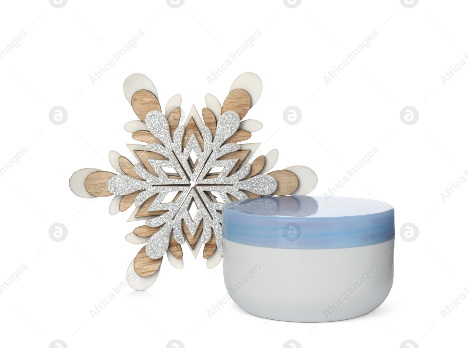 Photo of Jar of cream and snowflake on white background. Winter skin care