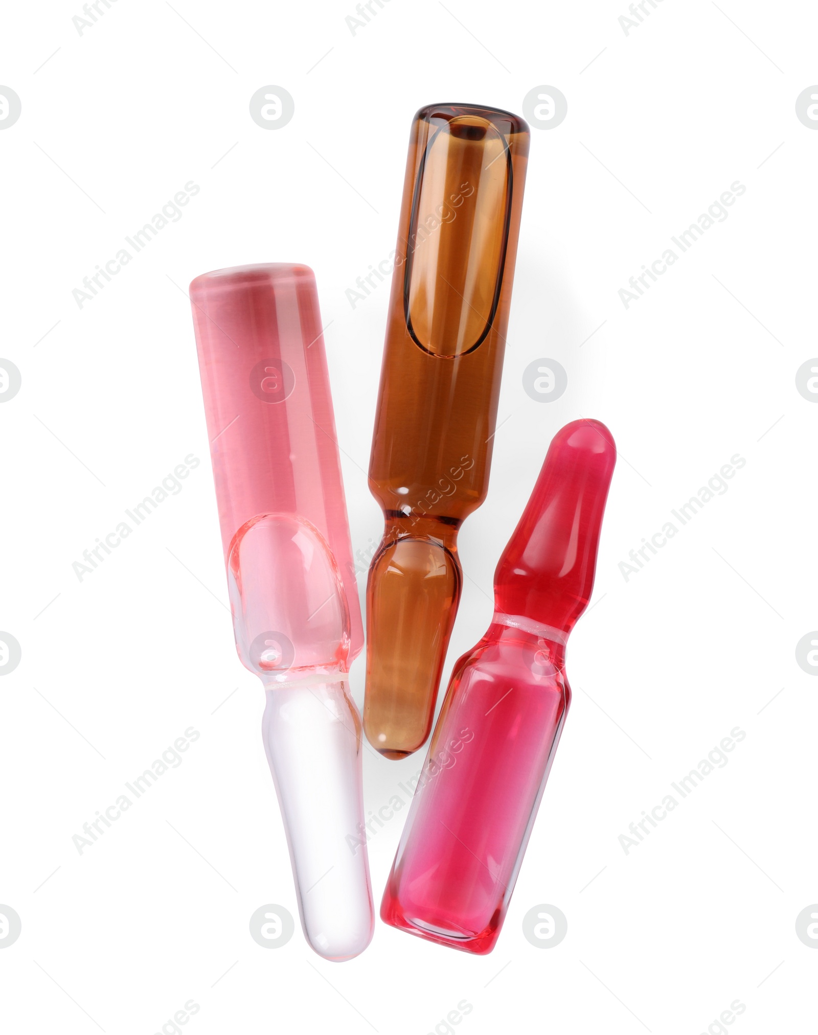 Photo of Glass ampoules with pharmaceutical products on white background, top view