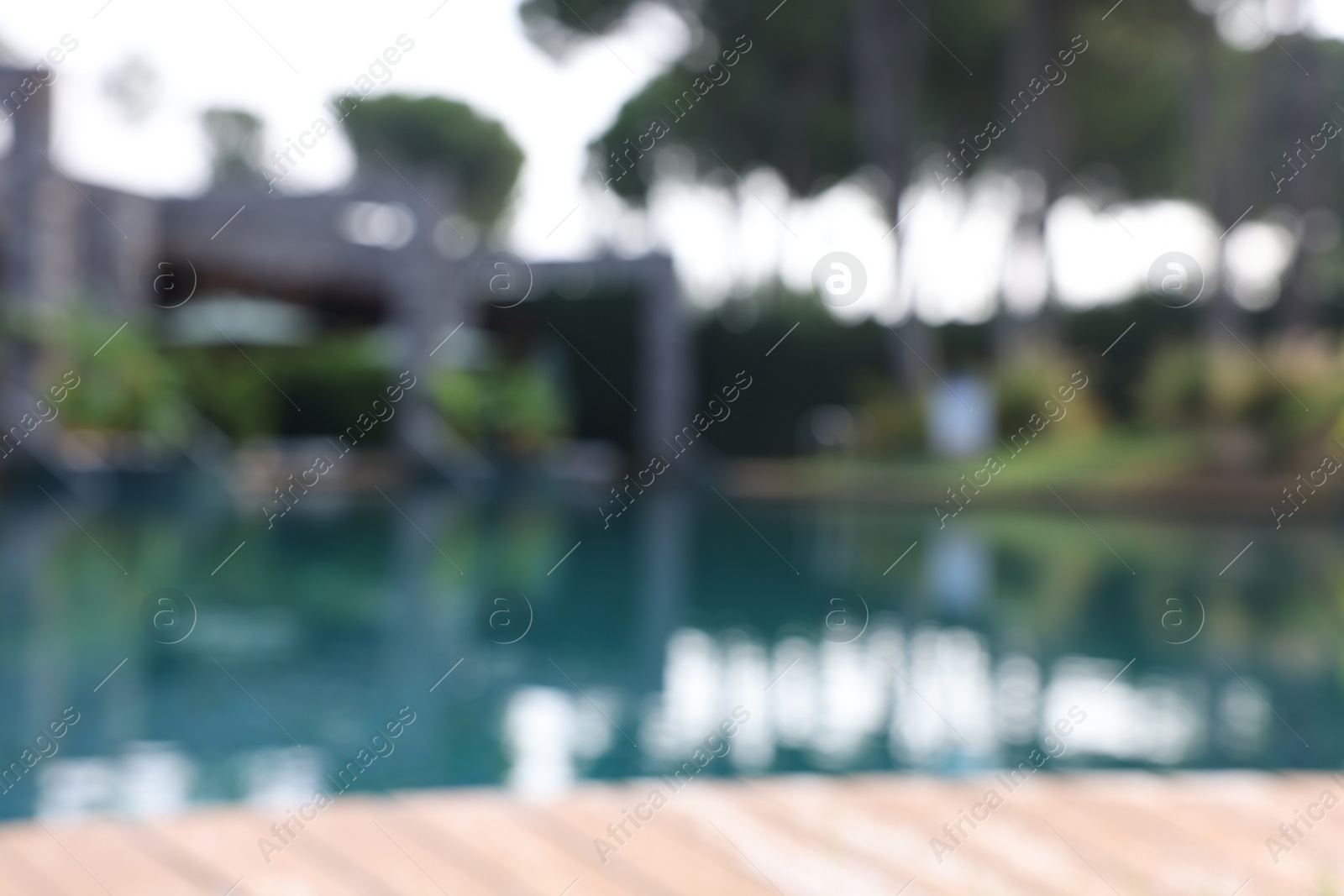 Photo of Blurred view of outdoor swimming pool at luxury resort