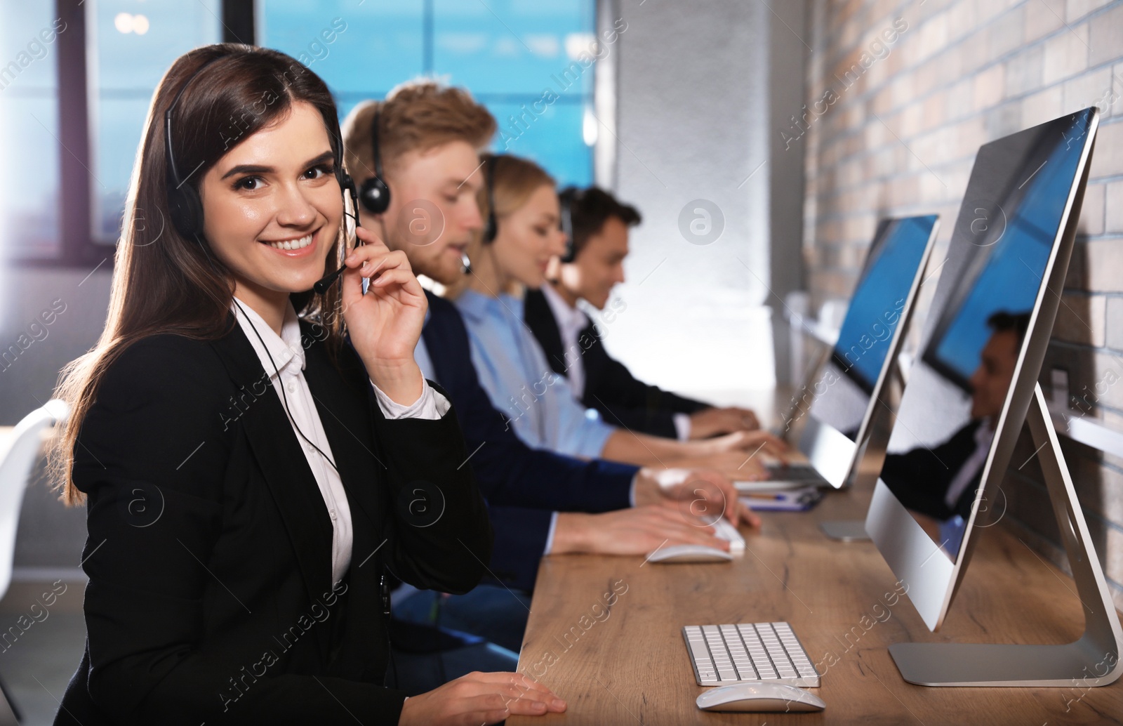 Photo of Technical support team working in modern office