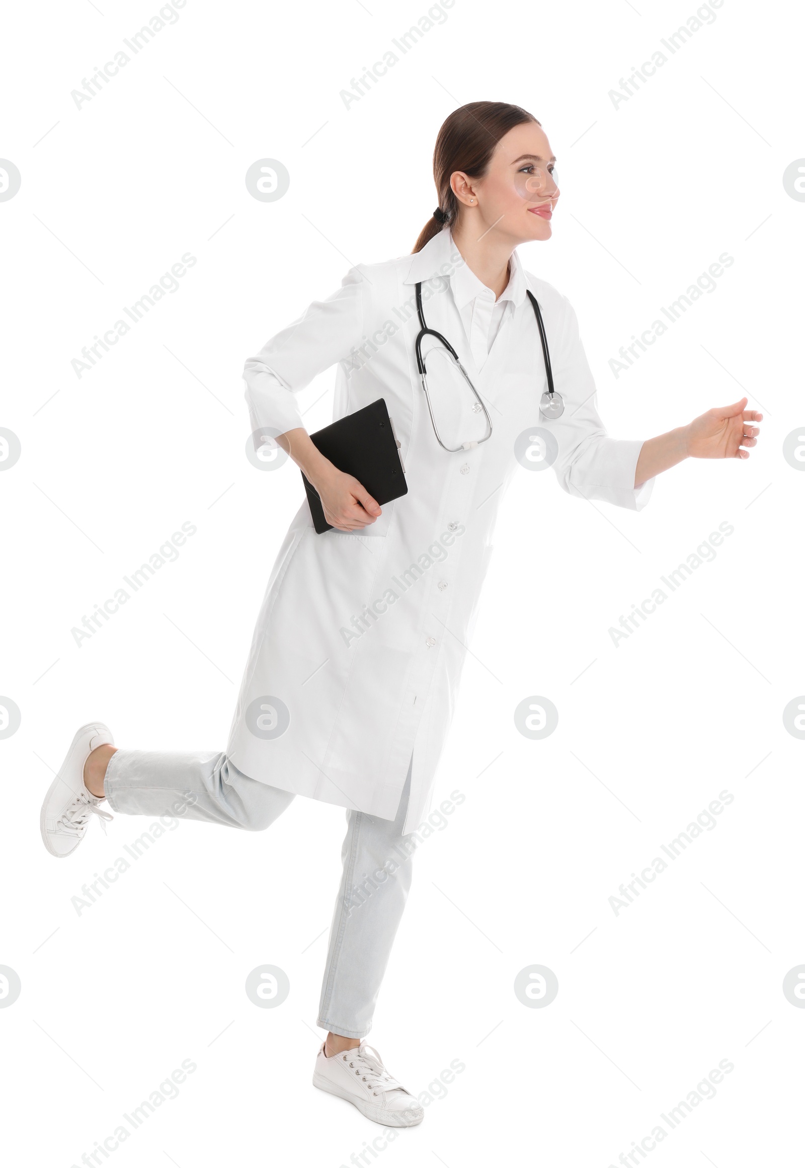 Photo of Doctor with clipboard running on white background