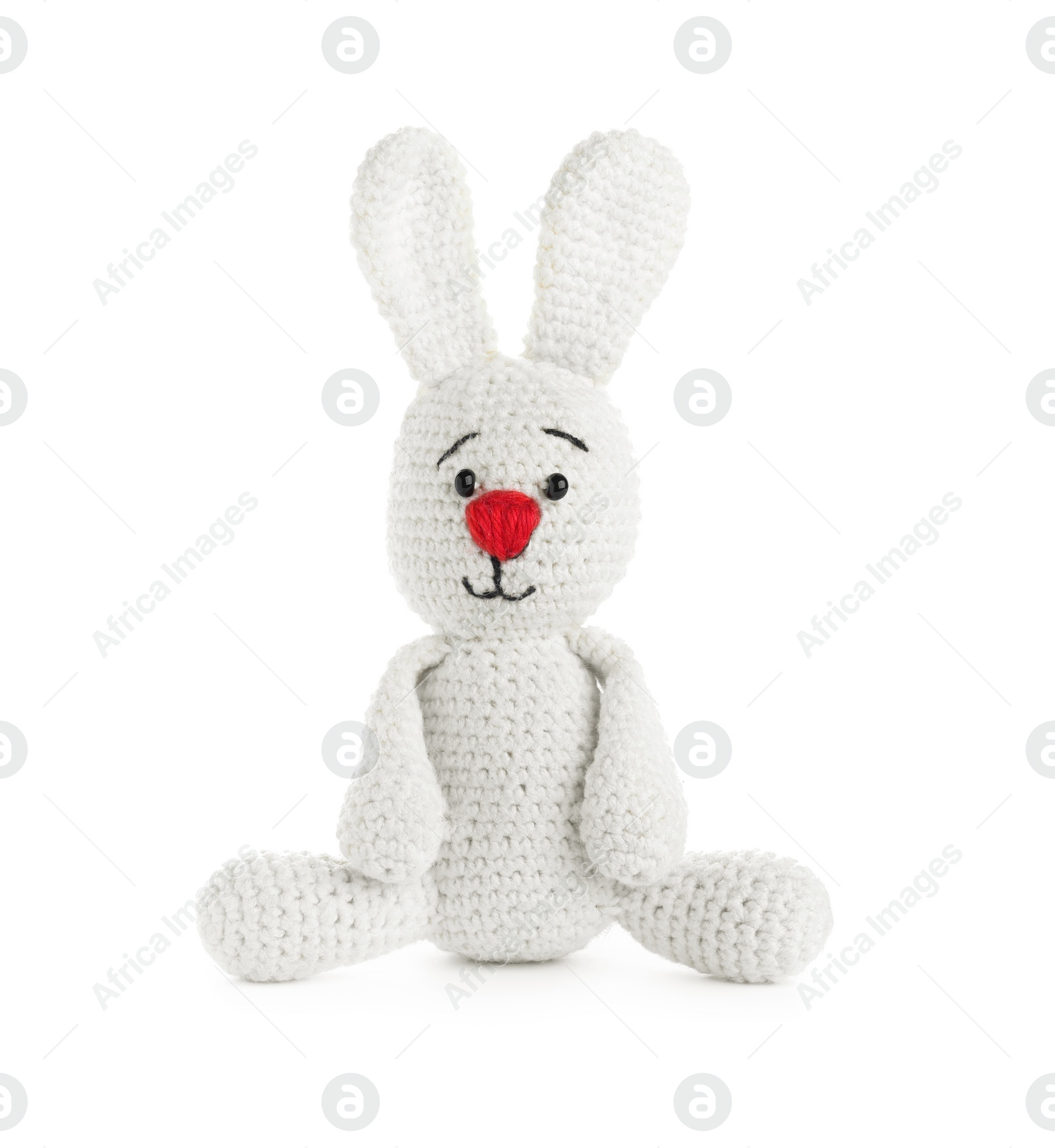 Photo of Cute knitted toy bunny isolated on white