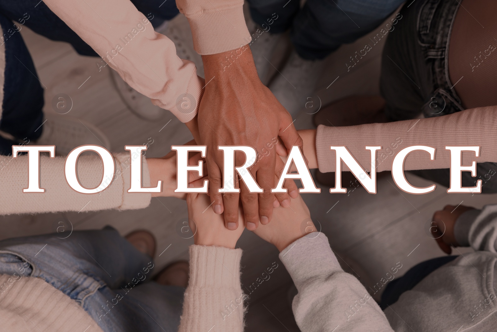 Image of Tolerance, support and cooperation concept. Group of multiracial people joining hands together, top view