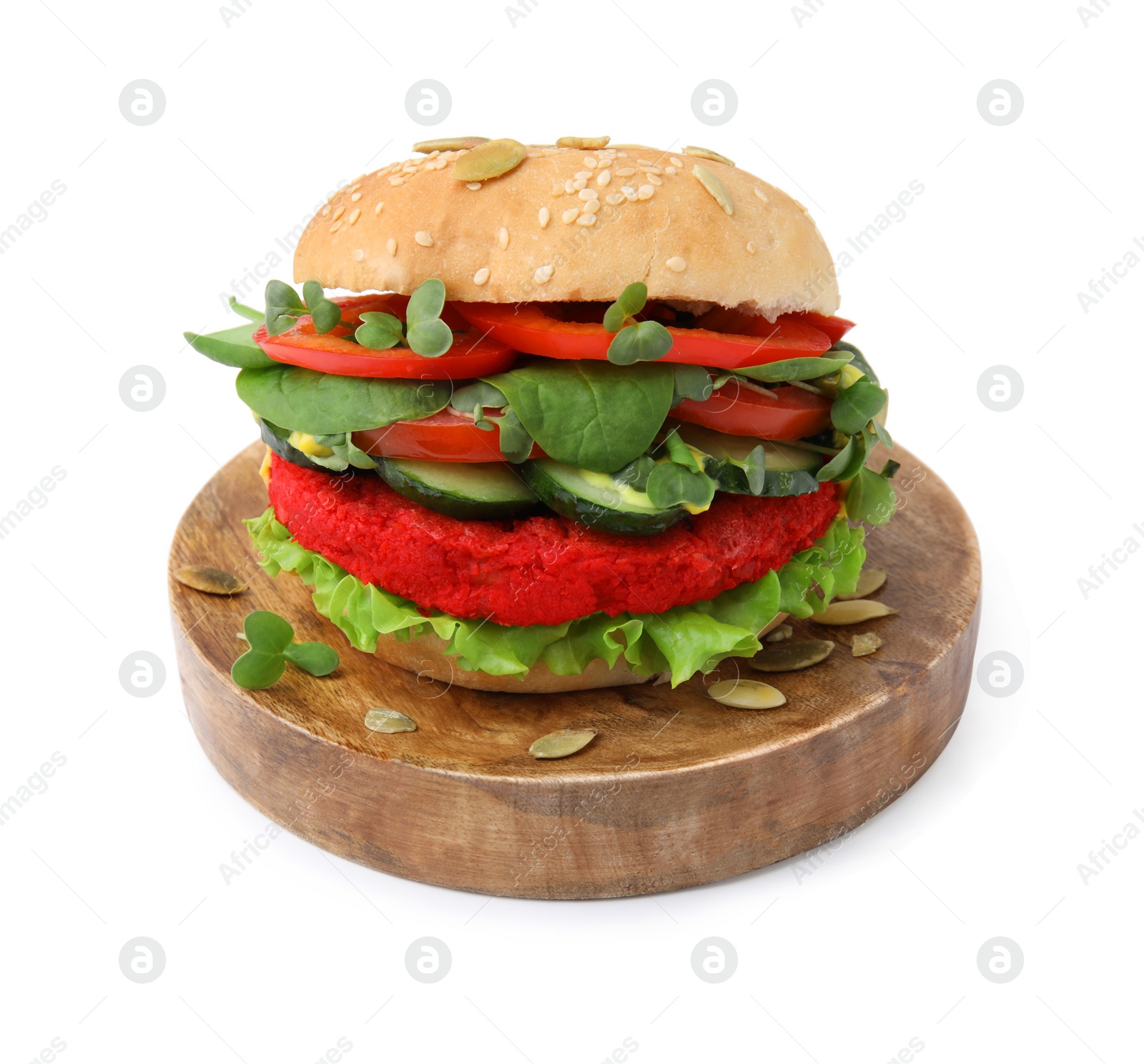 Photo of Tasty vegan burger with vegetables, patty and microgreens isolated on white