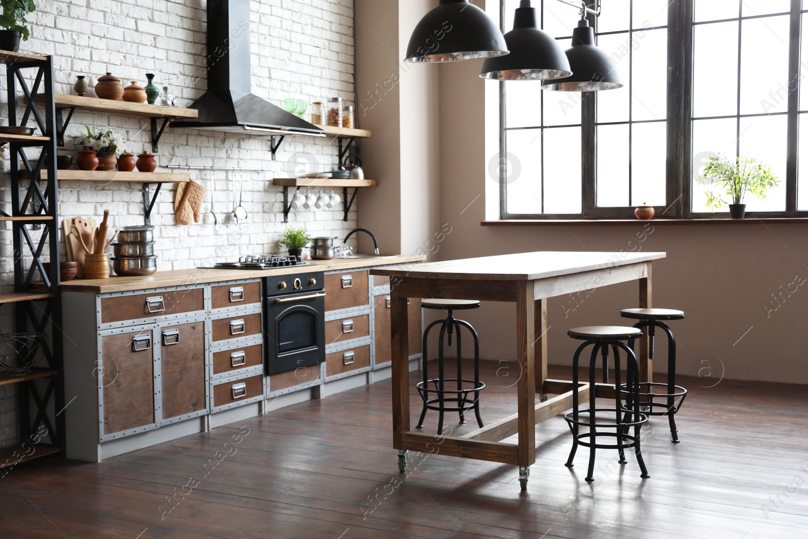 Photo of Beautiful kitchen interior with new stylish furniture