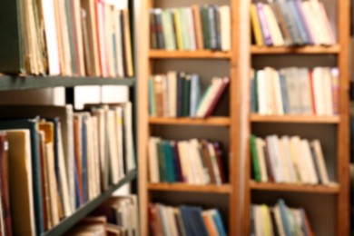 Photo of Blurred view of books on shelves in library