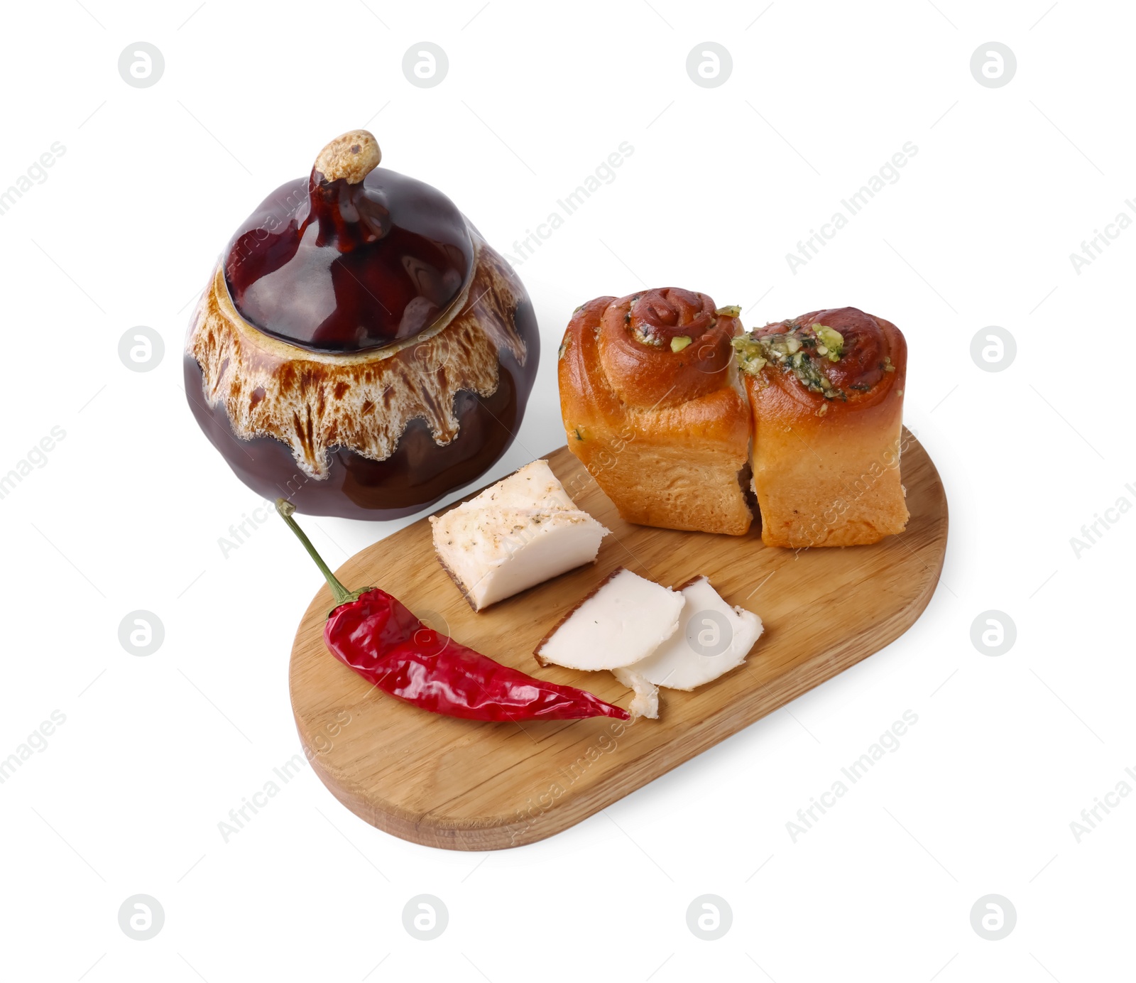 Photo of Delicious pampushky (buns), salo and pepper served for borsch isolated on white