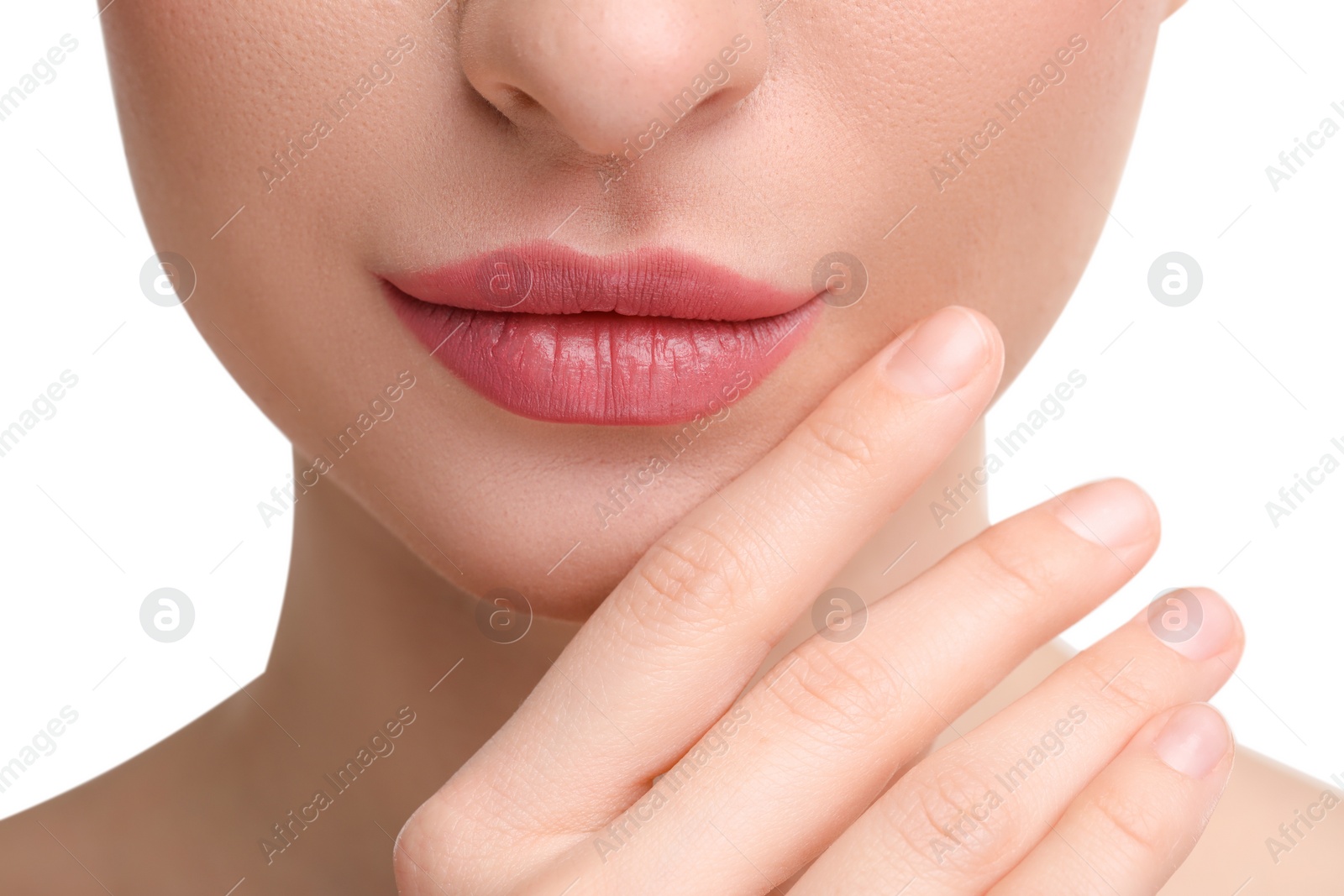 Photo of Young woman with beautiful full lips on white background, closeup