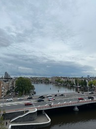 Photo of Amterdam, Netherlands - September 22, 2023: Beautiful view on city under cloudy sky