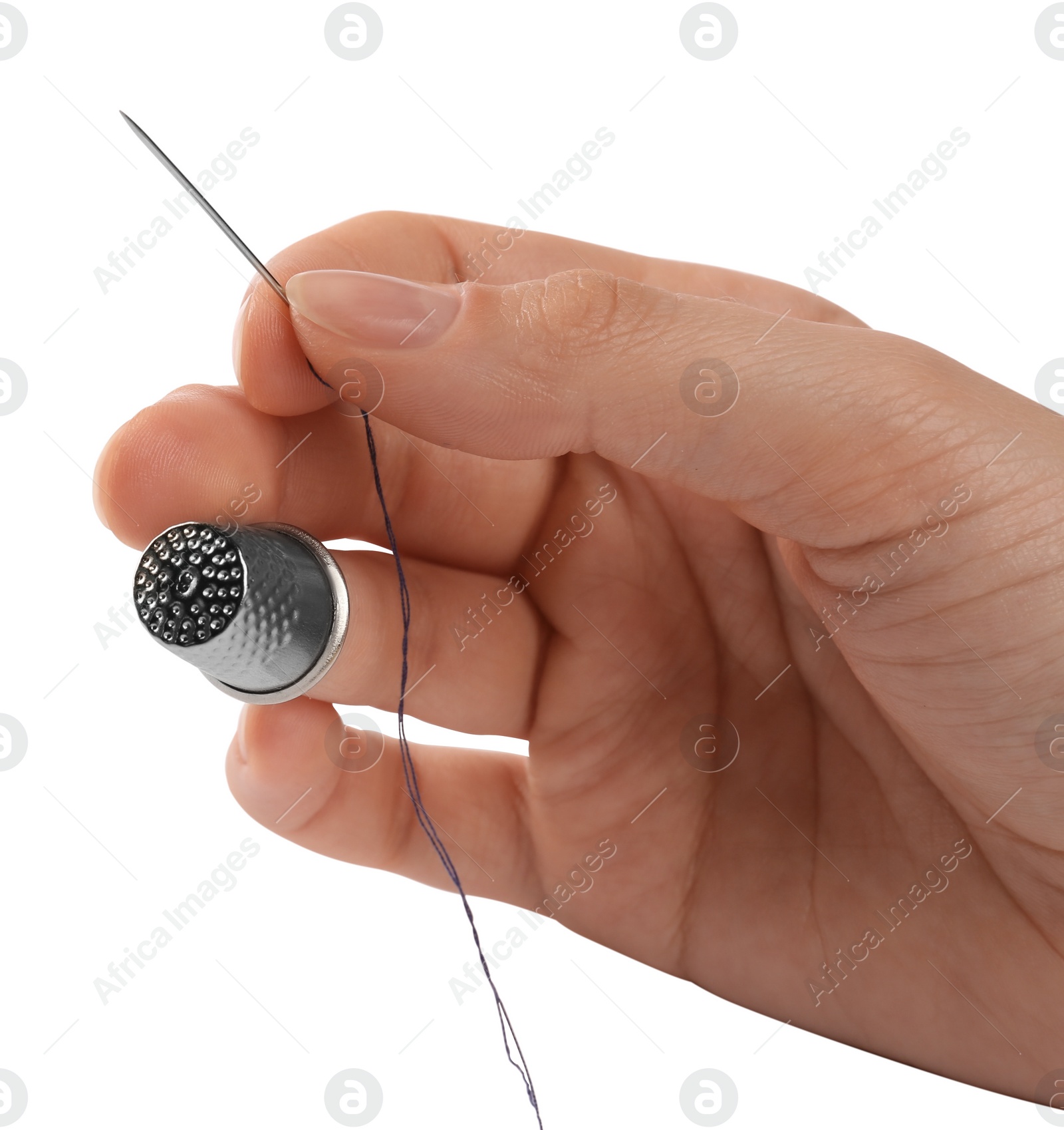 Photo of Woman with thimble, thread and sewing needle on white background, closeup