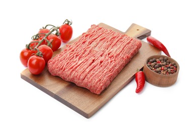 Wooden board with raw fresh minced meat and other ingredients on white background