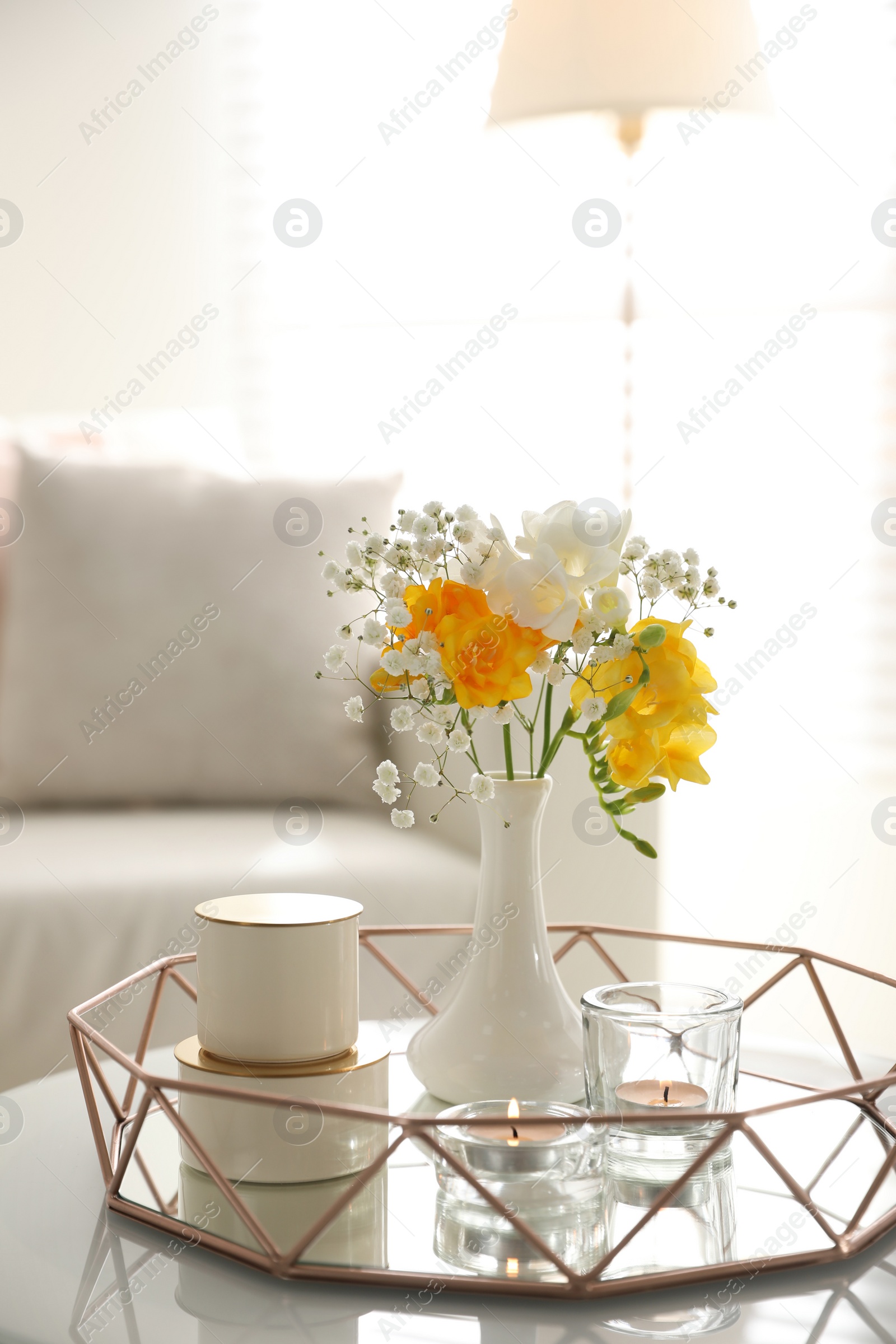 Photo of Beautiful bouquet with spring freesia flowers in light room