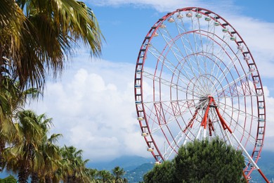 Photo of Beautiful large Ferris wheel outdoors on sunny day