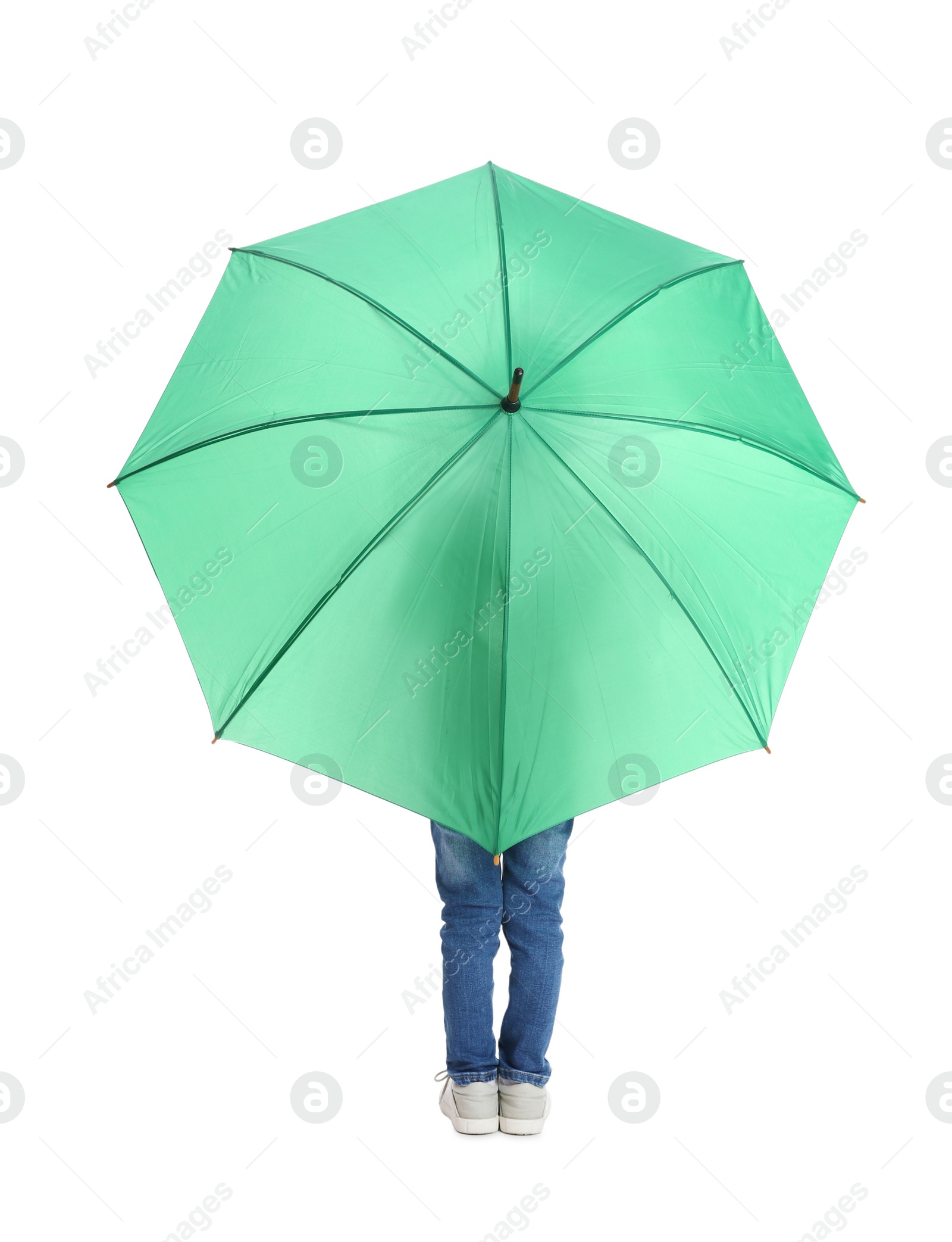 Photo of Little boy with green umbrella on white background