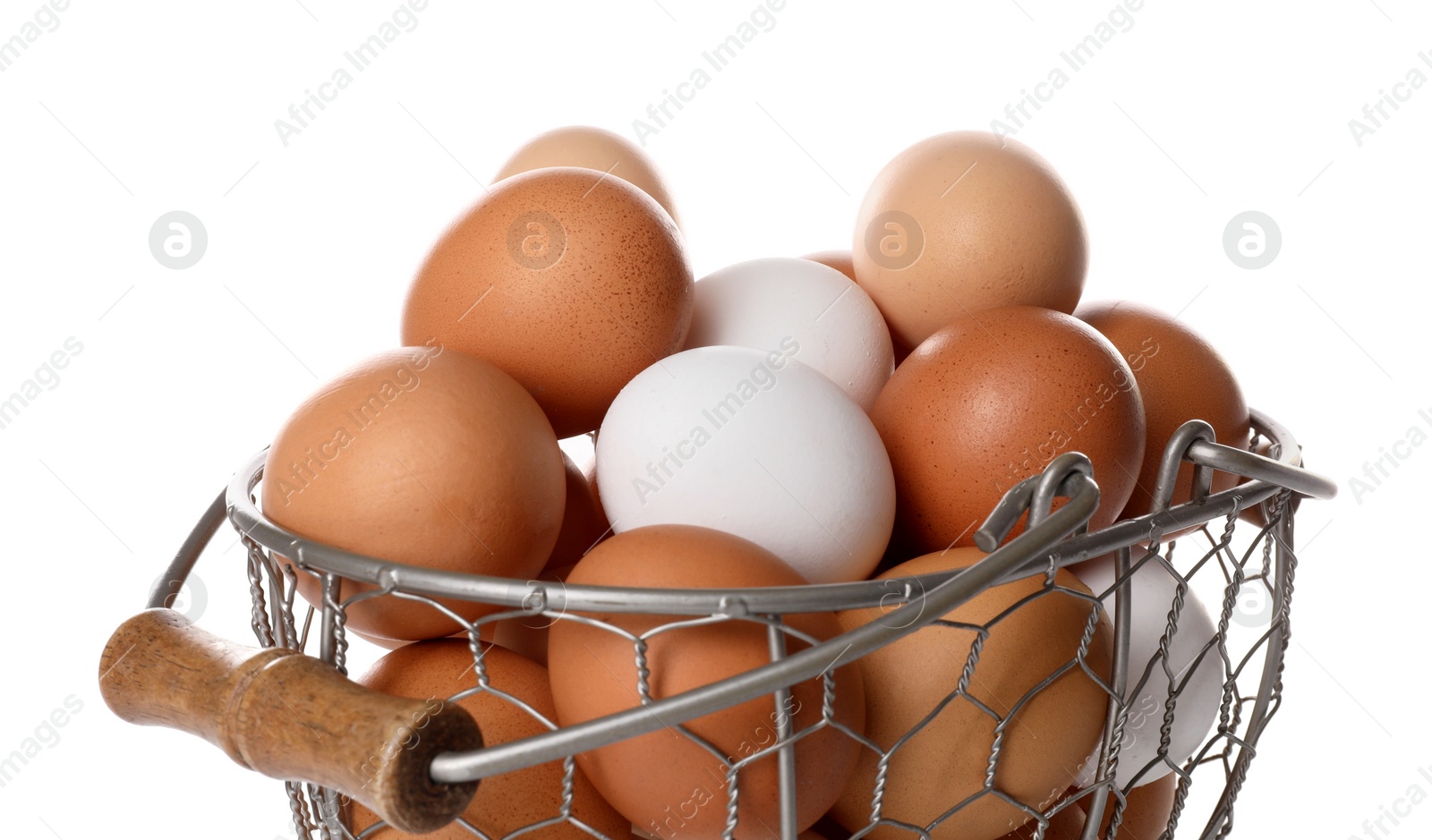 Photo of Fresh chicken eggs in metal basket isolated on white