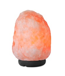 Photo of Pink Himalayan salt lamp isolated on white