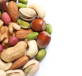 Pile of mixed organic nuts on white background