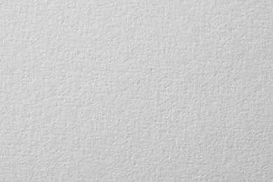 Photo of Texture of white paper sheet as background, closeup