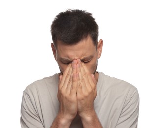 Photo of Man suffering from eyestrain on white background