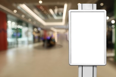 Blank advertising board in shopping mall. Space for text