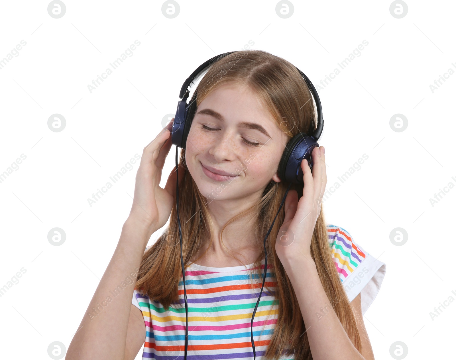 Photo of Teen girl listening to music with headphones on white background