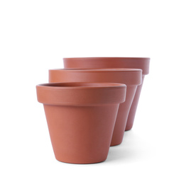 Stylish terracotta flower pots isolated on white