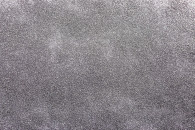 Photo of Beautiful shiny silver glitter as background, top view