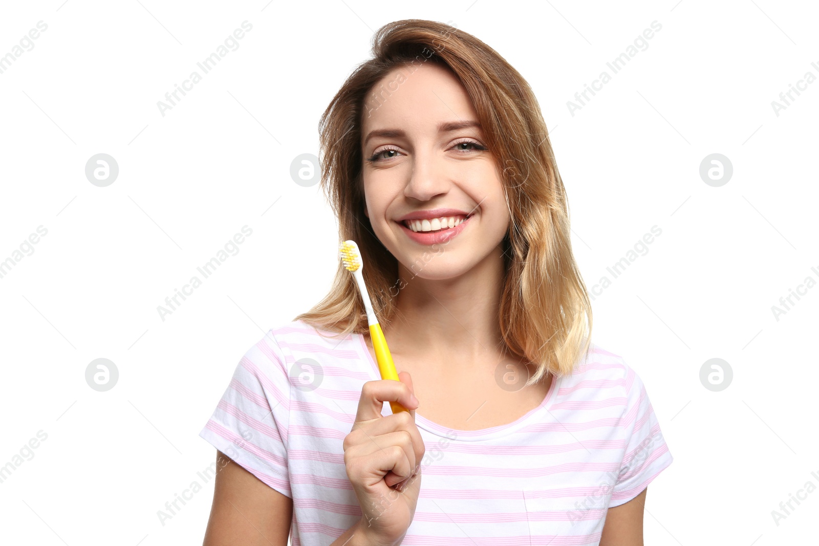 Photo of Portrait of young woman with toothbrush on white background