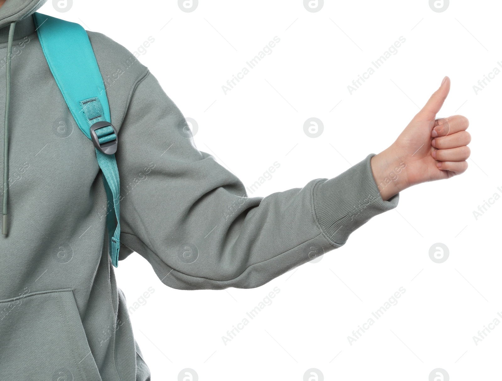 Photo of Woman with backpack hitchhiking on white background, closeup