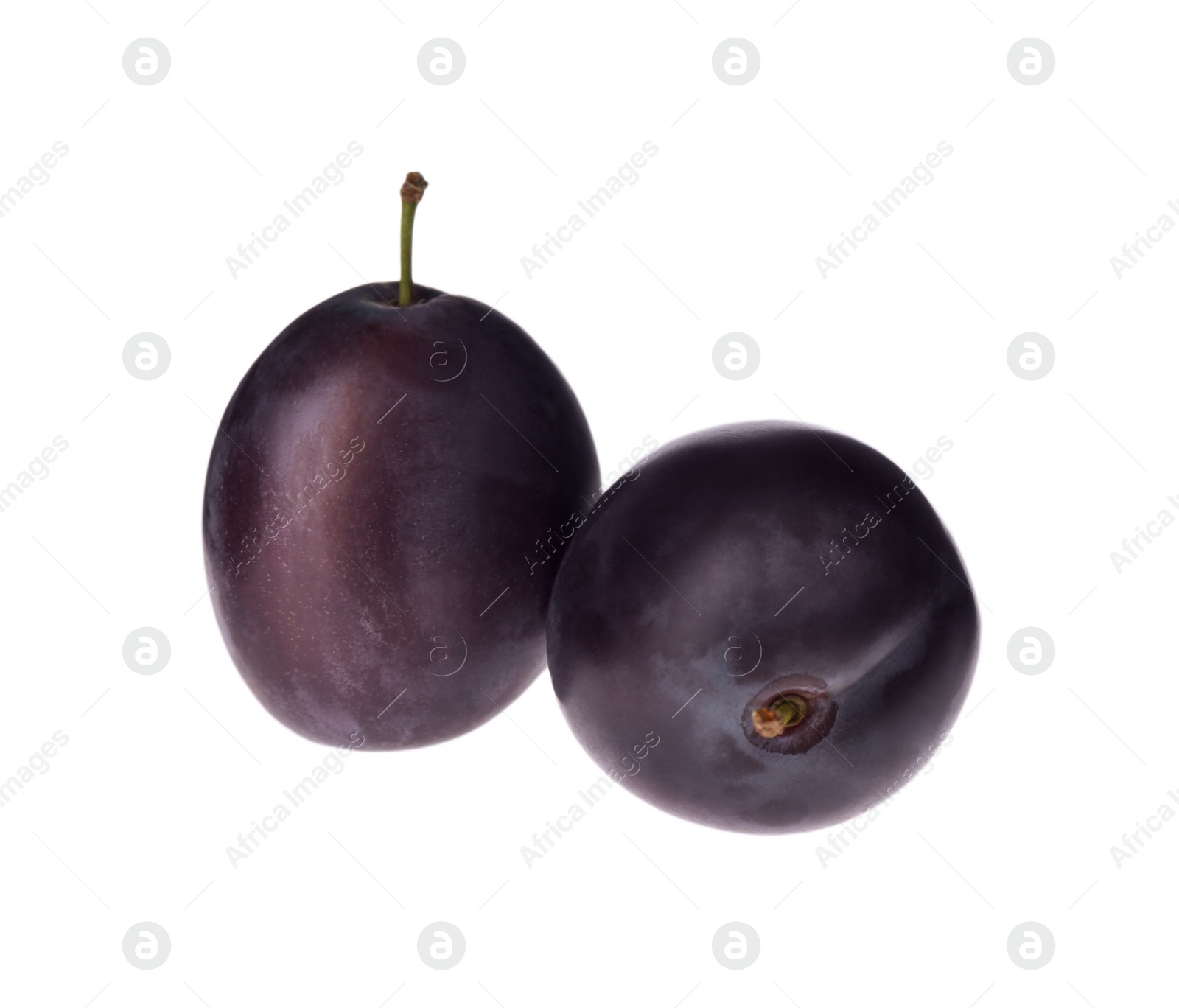 Photo of Delicious fresh ripe plums isolated on white