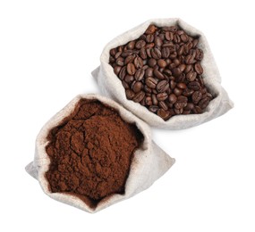 Photo of Bags with different types of coffee on white background, top view