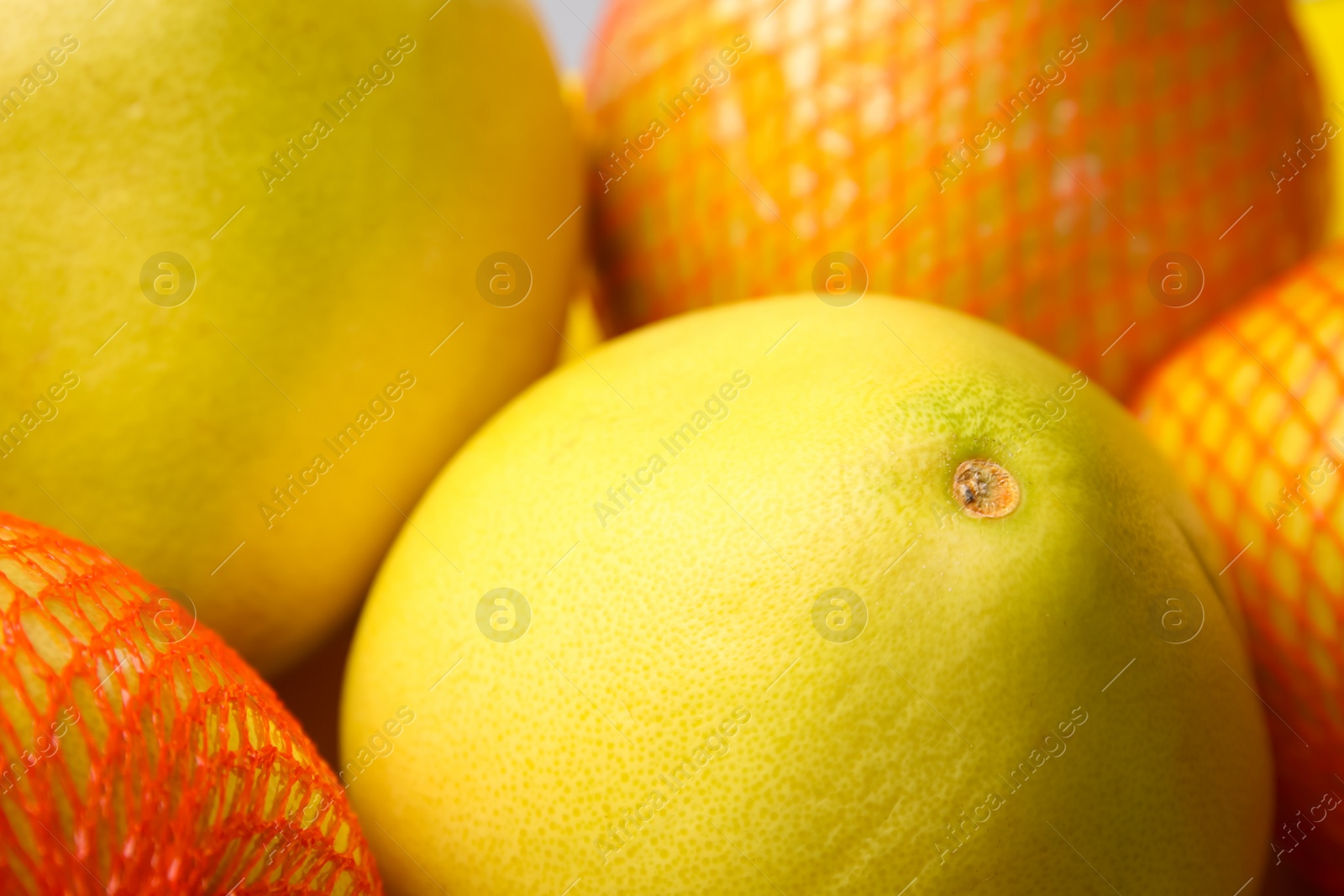Photo of Many tasty fresh pomelo fruits, closeup view