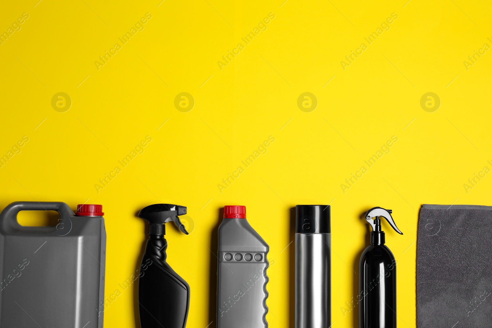 Photo of Different car products on yellow background, flat lay. Space for text