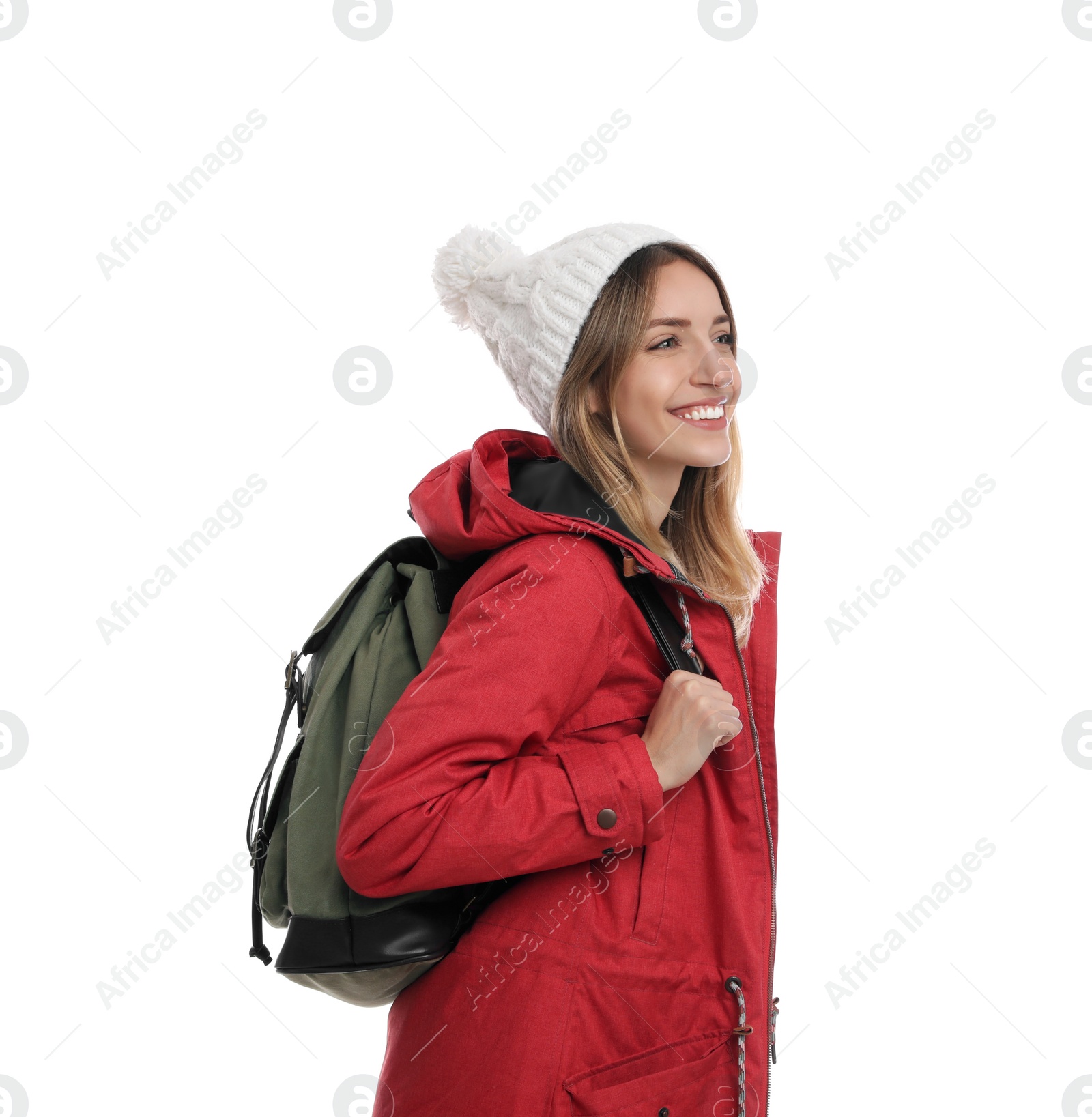 Photo of Happy woman with backpack on white background. Winter travel