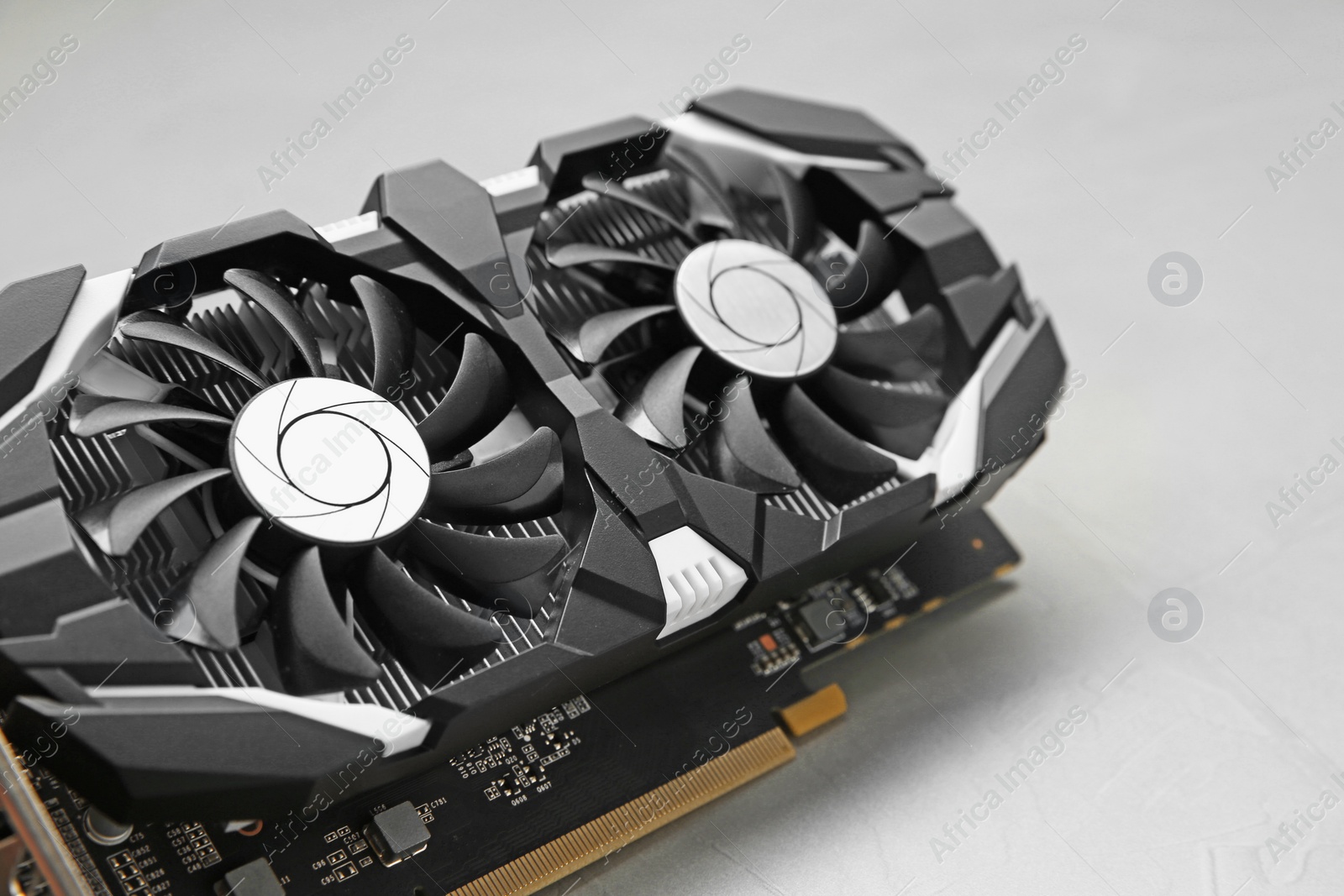 Photo of Computer graphics card on gray background, closeup