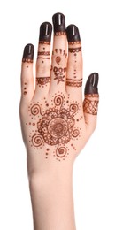 Woman with henna tattoo on hand against white background, closeup. Traditional mehndi ornament