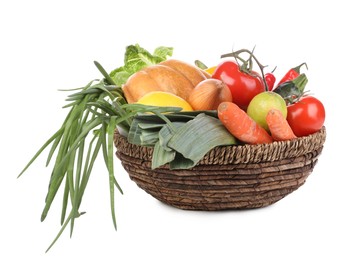 Fresh ripe vegetables and fruits in wicker bowl on white background