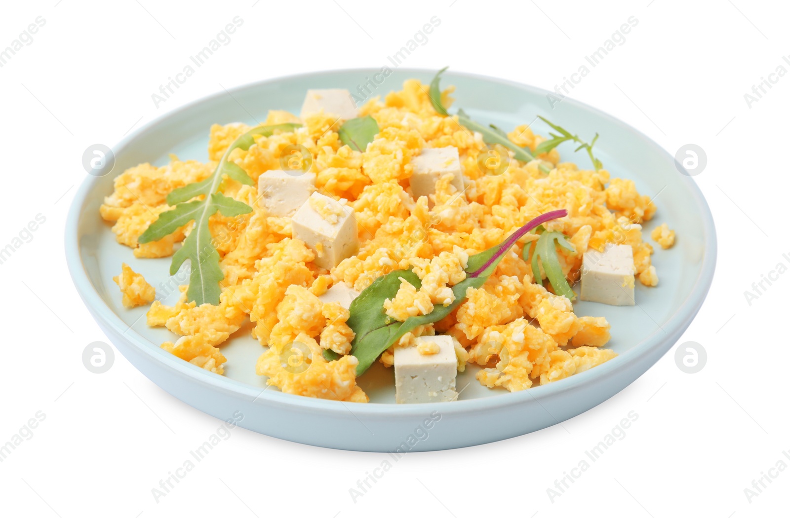 Photo of Plate with delicious scrambled eggs and tofu isolated on white