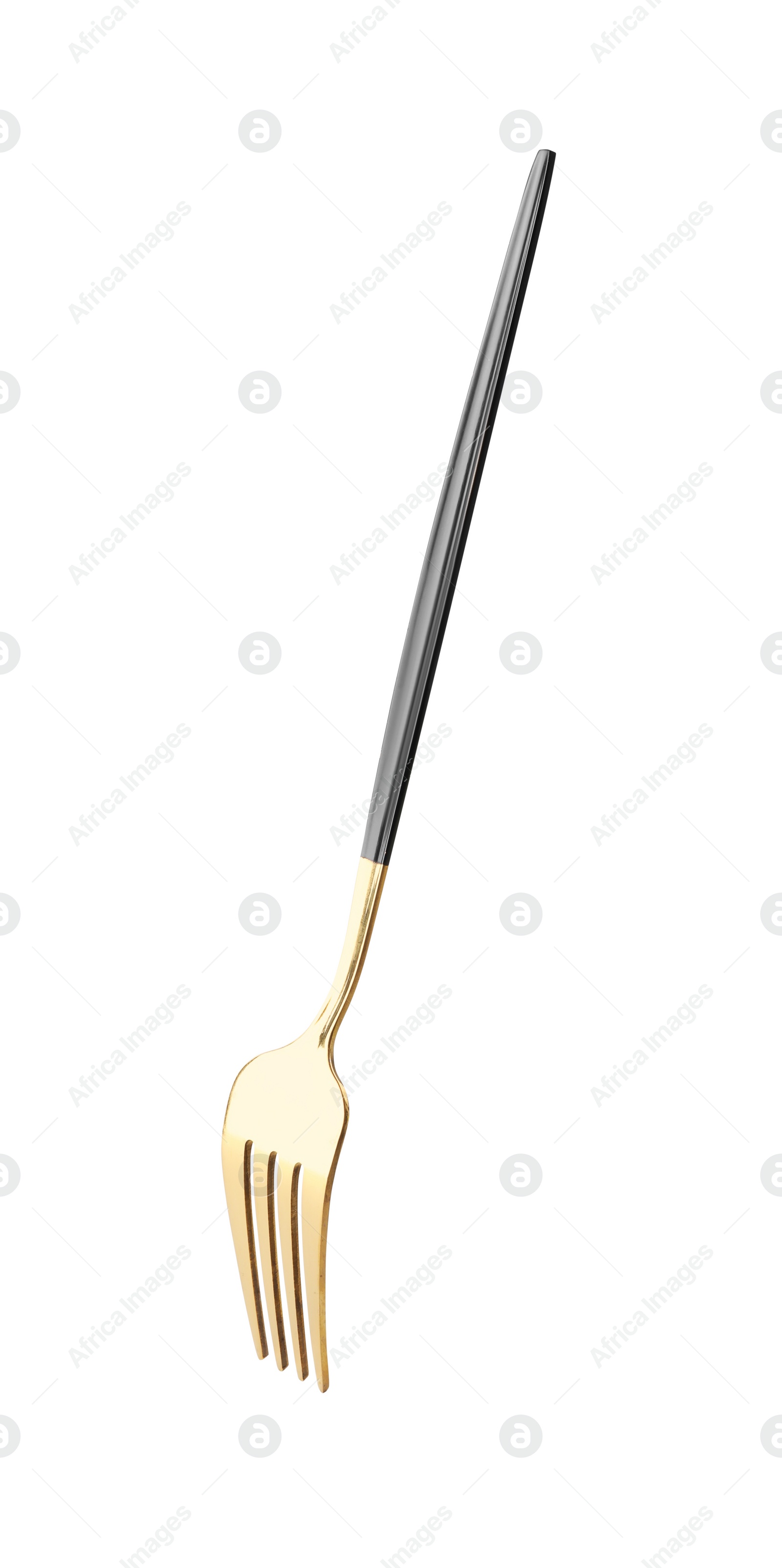 Photo of One shiny golden fork isolated on white