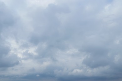 Sky with heavy rainy clouds on grey day