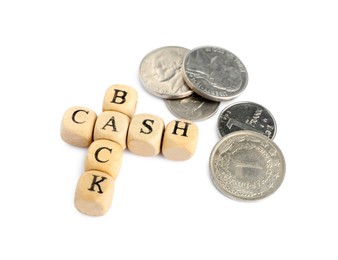 Photo of Wooden cubes with words Cash Back and coins on white background