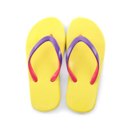 Photo of Pair of stylish yellow flip flops isolated on white, top view. Beach object