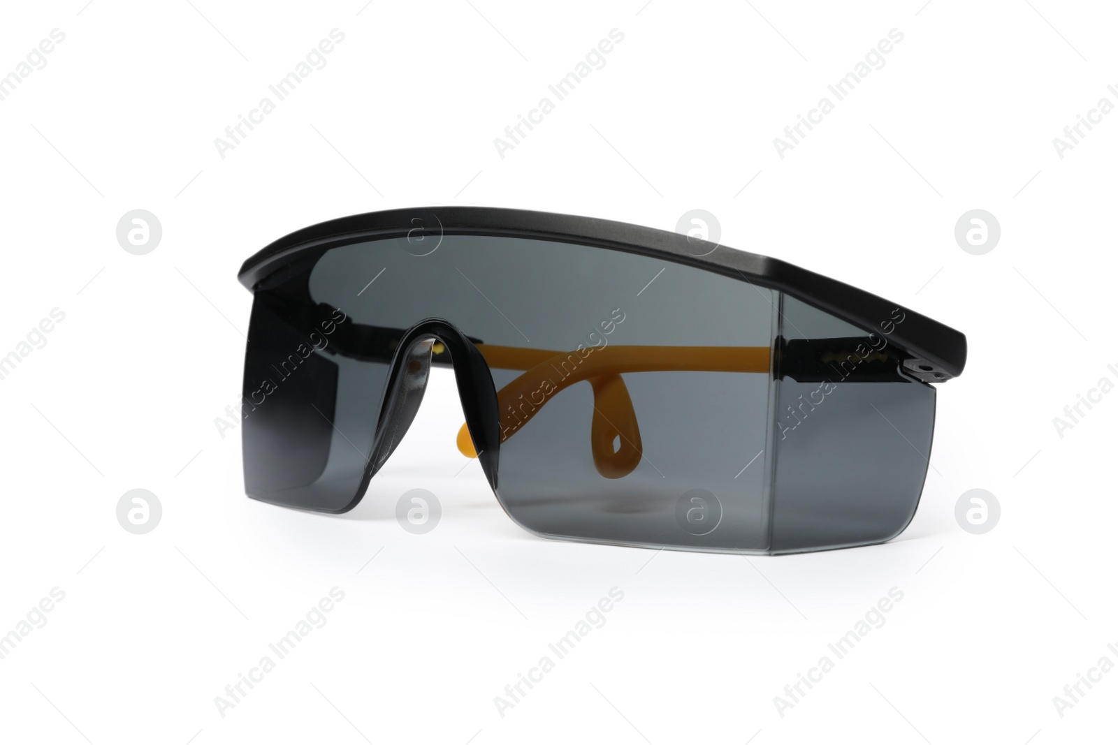 Photo of Protective goggles on white background. Construction tool